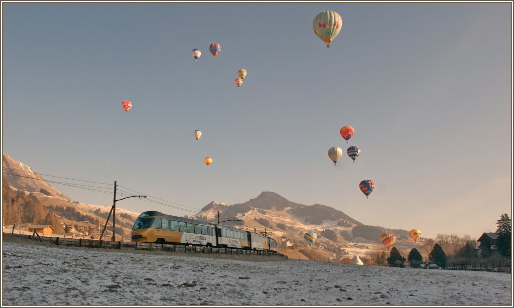 Der Golden Pass Panormamic Express w�hrend des Ballonfestivals bei Ch�teau d'Oex. 
23. Jan 2011