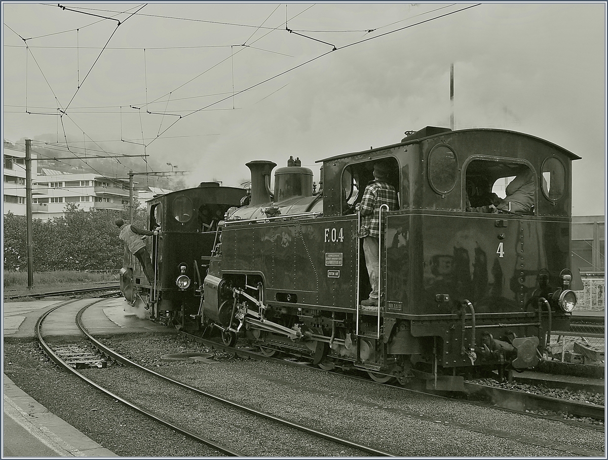 50 Jahre Blonay - Chamby; Mega Steam Festival: die Beidne HG 3/4 3 und 4 rangieren in Vevey um später ihren Riviera Belle Epoque Zug nach Chamby zu ziehen.
Bei Loks wurden 1913 gebaut, die HG 3/4BFD gehört der Blonay-Chamby Bahn und die FO N° 4 ist als Gastlok der Dampfbahn Furka Bergstreck zu Besuch.
13. Mai 2018
