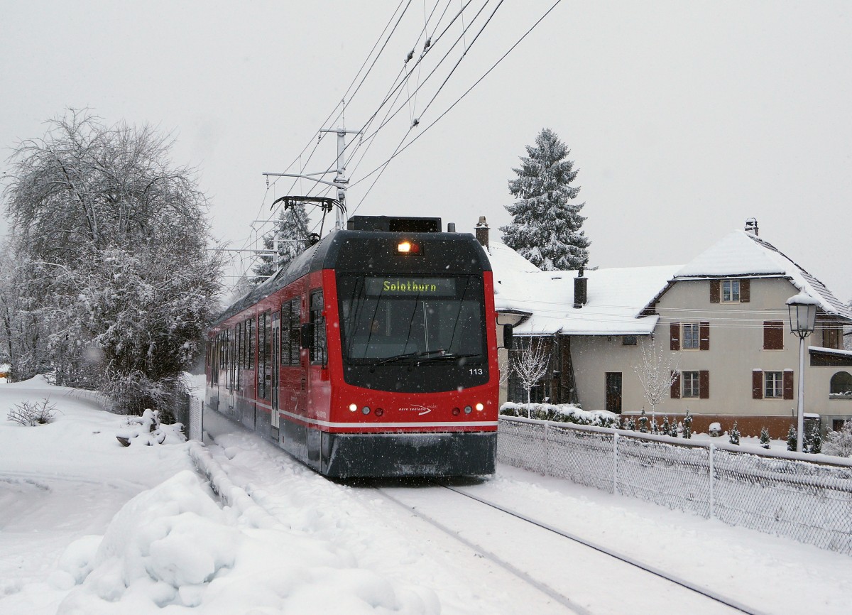 ASm: Aufnahmen dieser Art waren w�hrend dem diesj�hrigen Winter in der Region Solothurn nur an wenigen Tagen m�glich. Regionalzug Langenthal-Oensingen-Solothurn mit Be 4/8 113  STAR  bei Wiedlisbach am 28. Dezember 2014.
Foto: Walter Ruetsch