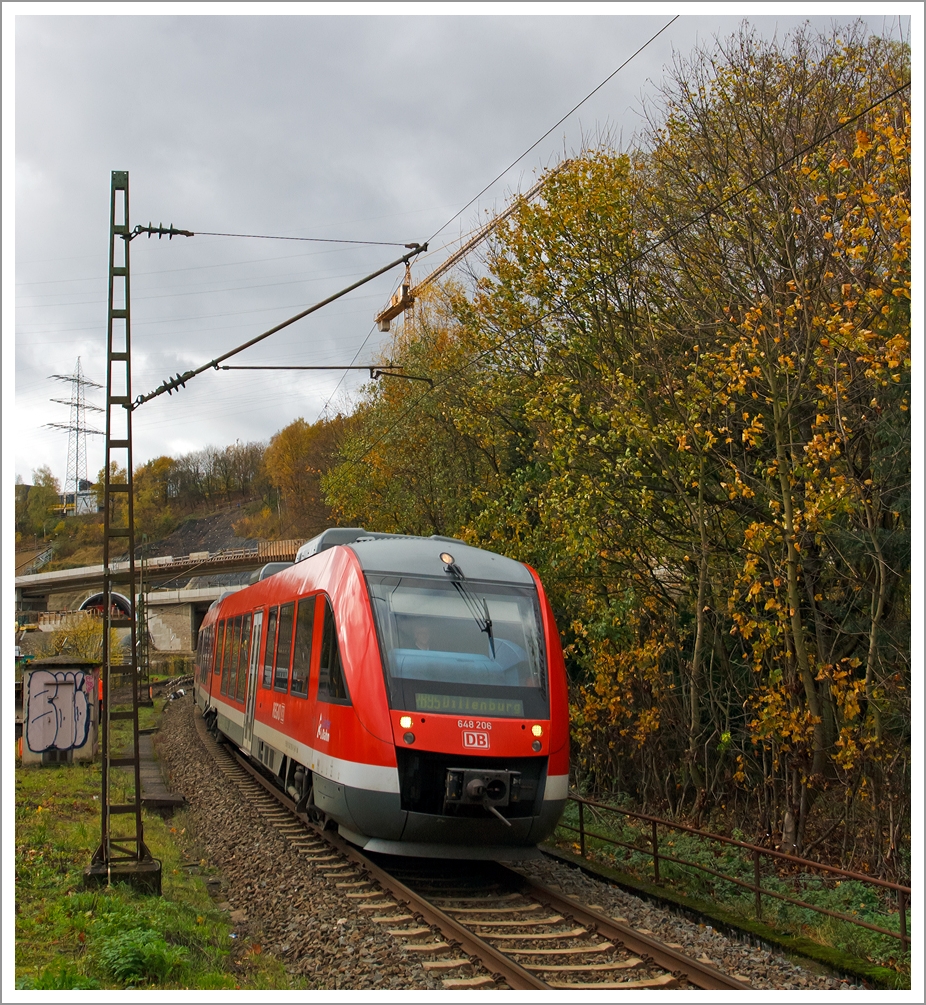 Dieseltriebwagen 648 206 / 706 ein Alstom Coradia LINT 41 der DreiL�nderBahn f�hrt als als RB 95 (Au/Sieg-Siegen-Dillenburg) am 09.11.2013 in den Bahnhof Eiserfeld (Sieg) ein.

