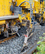   DETAIL-Bild:  Die Plasser & Theurer Schnell-Schotterplaniermaschine SSP 110 SW,  Schweres Nebenfahrzeug Nr.