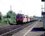 151 116-1 und eine weitere 151 mit Schüttgutwagen in Hetzerath am 17.08.2002.