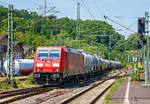 Die 185 313-4 (91 80 6185 313-4 D-DB) der DB Cargo Deutschland AG f�hrt am 26.05.2018 mit einem Kesselwagenzug durch Betzdorf (Sieg) in Richtung Siegen.