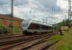 Ein  kuzer Flirt - ET 22002 (2-teiliger Stadler Flirt) der Abellio Rail NRW am 10.07.2012 kurz vor der Einfahrt in den Bahnhof Siegen-Geisweid, die Fahrtrichtung ist Hagen.