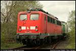 PRESS 140 047-9/ 140 801-2 steht hier zusammen mit der SETG V100.02(98 80 3202 287-9 D-ECCO)in Flensburg-Weiche abgestellt und wartet auf die Beladung ihres Holzzuges.