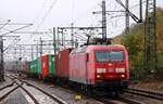 Der Tagespendel mit 145 044-4 und laaaangem Kisten Transport gen Hafen Hamburg. HH-Harburg 29.10.2022