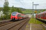   Zwei gekoppelte 4-teilige Bombardier Talent 2 ( 442 256 / 756 und 442 762 / 262) der DB Regio NRW fahren am 17.05.2015, als RE 9 (rsx - Rhein-Sieg-Express) Siegen - Köln - Aachen, durch den