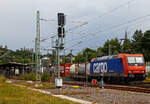 Die an die DB Cargo Deutschland AG vermietete Re 482 016-3 (91 85 4482 016-3 CH-SBBC) der SBB Cargo AG fährt am 20.08.2021 mit einem Container-Zug durch Betzdorf/Sieg in Richtung Köln.