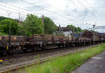 Vierachsiger Drehgestellflachwagen mit Seiten- und Stirnwandklappen, sowie mit Drehrungen, 31 80 394 8 024-5 D-DB der Gattung Remms 665, der DB Cargo AG, am 21 Mai 2024, beladen mit Rundstahl, im