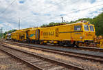   Die Plasser & Theurer Universalstopfmaschine UNIMAT 09-4x4/4S (Kombinierte Gleis- und Weichenstopfmaschine), Schweres Nebenfahrzeug Nr.