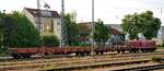 212 089-7 rangiert mit zwei Rungenwagen 37 RIV 80 D-VTG 3941 111-5 Rvs und 37 80 3349 976-0 D-BKE Rlmms in Ulm am 20.05.2023.