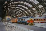 Die FS E 656 438 steht mit ihrem Schnellzug nach Stuttgart unter dem mächtigen Hallendach von Milano Centrale und wartet auf die Abfahrt.

Analogbild vom 28. Juni 1997