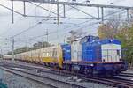 Endspiel für DM'90 am 13.November 2019 in Nijmegen. Nachdem ein verkauf nach Rumänien fehlschlug wurden die 42 in Nijmegen z-gestellte DM'90 Dieseltriebzüge abgeschleppt und Volker Rail schickte zwei 203er als Schleploks. Hier verlässt 203-5 mit vier DM'90 Züge NIjmegen am 13 November 2019. 