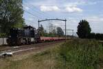 MRCE 5001511 zieht ein Leerzug durch Hultem am 2 September 2022.