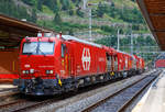 Der Erstfelder SBB L�sch- und Rettungszug 2014 „Uri“ (ein vierteiliger LRZ 14) am 02 August 2019 beim Halt im Bahnhof G�schenen.