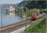 Vor der Kulisse des Château de Chillon ist der SBB Tm 234 418-2  DART  (Tm98 85 5 234 418-2 CH SBBI) ist mit zwei Dienstwagen in Richtung Villeneuve unterwegs.

17. April 2026