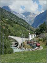 Wolken Br�cke(n) eine sch�ne Landschaft und mittendrin der MGB Zug auf dem Weg nach Zermatt.