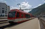 Im leichten Gegenlicht - Der MGB Niederflur-Panoramatriebzug  Stadler - KOMET ABDeh 4/10 2012 f�hrt am 28.05.2012 von Brig in Richtung Zermatt.