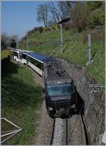 Eine MOB Ge 4/4 mit ihrem Panoramic Express kurz vor der 270° Kurve in Sonzier auf dem Weg Richtung Montreux.