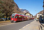 Ein RhB Regional-Zug erreicht am 19.02.2017 Tirano, der Zug besteht aus dem 3-teiligen ALLEGRA-Zweispannungstriebzug (RhB ABe 8/12) 3515  Alois Carigiet  mit 5 angehangenen Personenwagen.