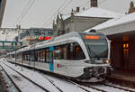 Ein elektrischer Triebzug der THURBO AG, bestehend aus einem Stadler GTW 2/8 gekuppelt mit einem Stadler GTW 2/6, steht am 08.12.2012, als S 14 (der S-Bahn St.
