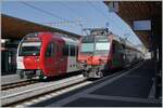 TPF Normal- und Schmalspur in Bulle mit dem Be 2/4 103 nach Gruyère  und einem TPF RBDe 560  Domino  nach Bern.