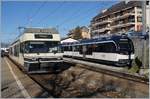 Ein CEV MVR GTW Be 2/6 bei Halt in Chernex, recht im Bild ein neuer MOB  Alpina   8.