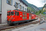   Der Elektrische Zahnradgep�cktriebwagen MGB Deh 4 /4 II - 93 „Oberwald“, ex FO Deh 4/4 II – 93, steht am 02.08.2019 mit ihrem Sch�llenenbahn Regionalzug nach Andermatt, im Bahnhof